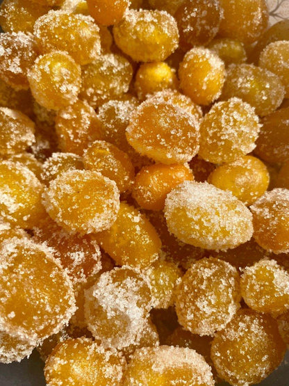 Gros plan kumquat confit déshydraté – texture brillante et acidulée