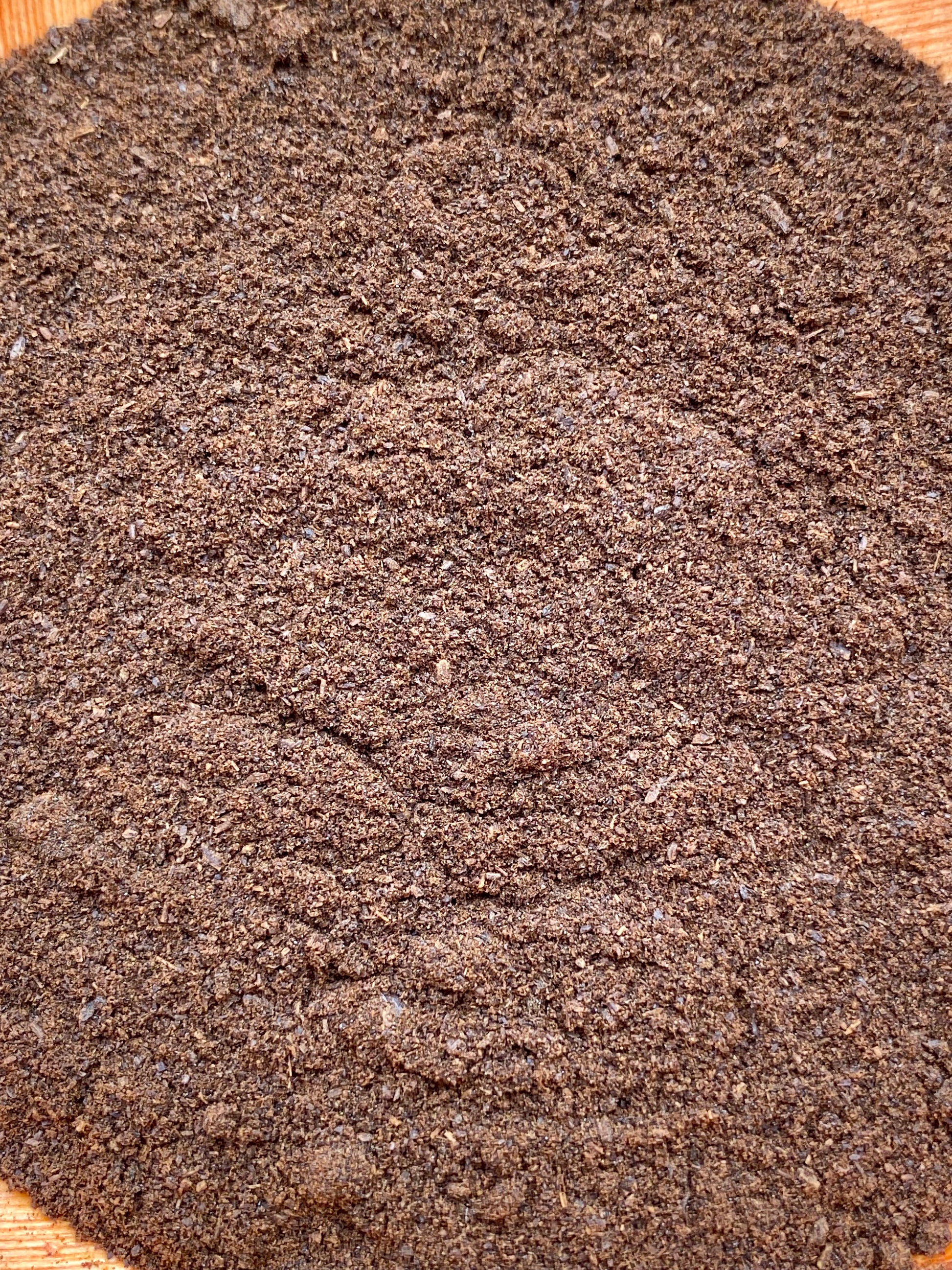 Texture fine de poudre de vanille de Madagascar issue de gousses moulues